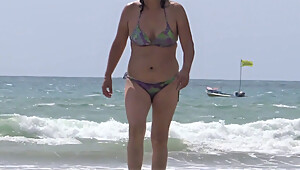 Mature wife enjoys sex on the beach, full cumshot