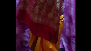 Desi Hot Girl Showing Her Assets Stripping In Saree