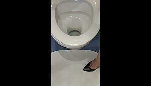 my wife poured into the toilet in high heels